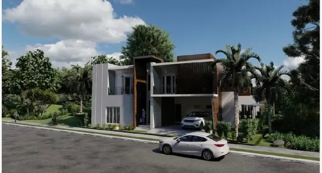 Modern Punta Cana villa exterior with driveway and tropical landscaping